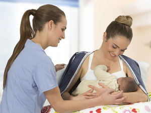 mum-breastfeeding-her-baby-with-lactation-clonsultant.jpg